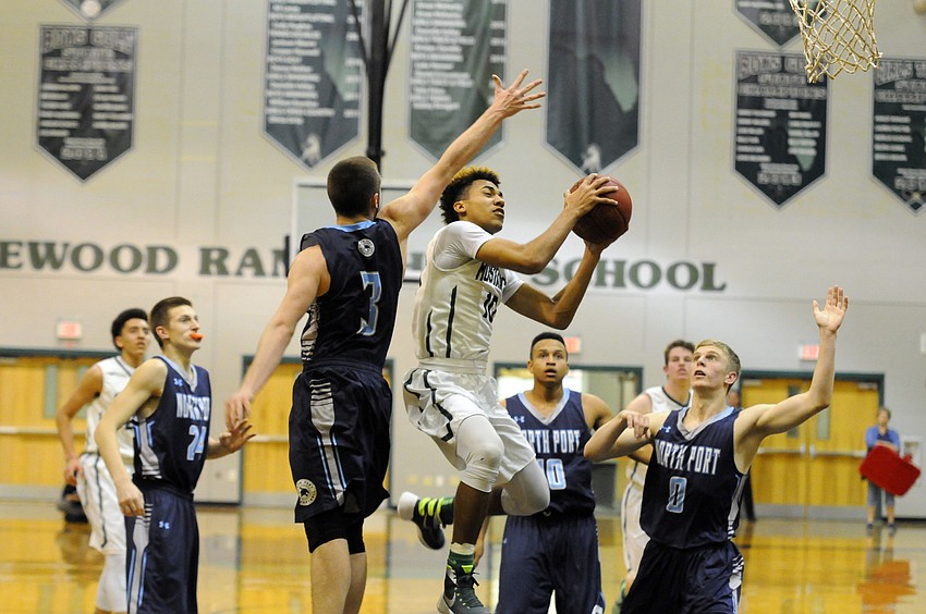 Lakewood Ranch sophomore guard Damien Gordon goes up for a layup in the first half.