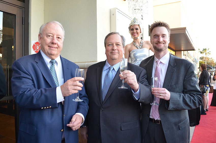 President and CEO for Cobb Theatres Robert M. Cobb with Vice President of CinéBistro, Food & Beverage Fred Meyers and Jason Waganheim toast to the opening of CineBistro Westfield Southgate.