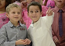 Jeremy Fisher and Diego Castellanos find their families out in the audience.