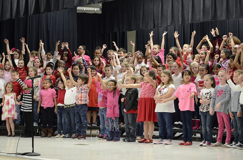First-graders sing a classic, Take Me Out to the Ball Game.