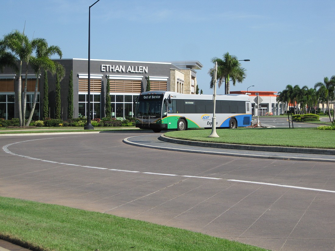 A SCAT bus makes its way through the University Town Center area on Cattlemen Road. Courtesy photo.