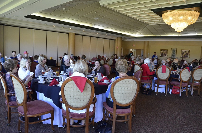 Palm Aire Women's Club members meet for their monthly luncheon at the country club.