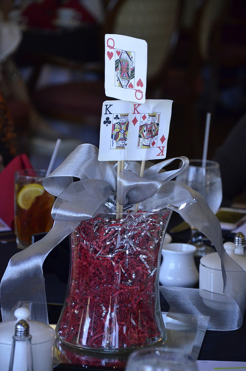 The table centerpieces featured poker cards.