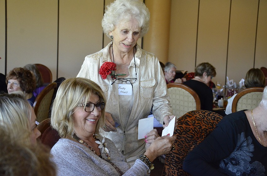 Kathleen Allen wins a Carrabba's gift card from Judy Hall.