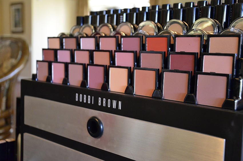 Two makeup artists gave club members makeup tips.