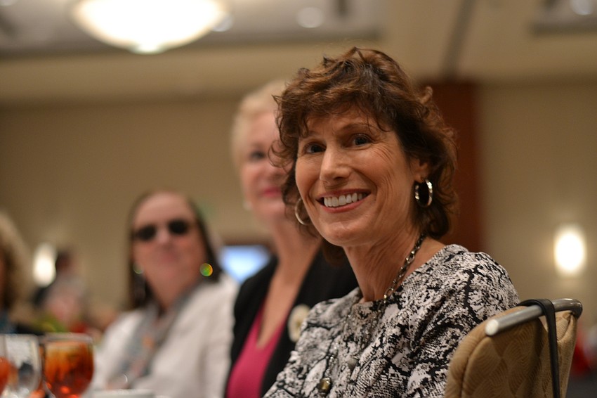 Jean Ruff watches the models come down the runway.