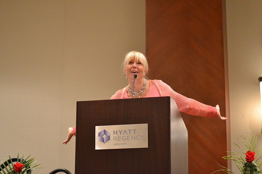 Designer Sigrid Olson addresses guests.