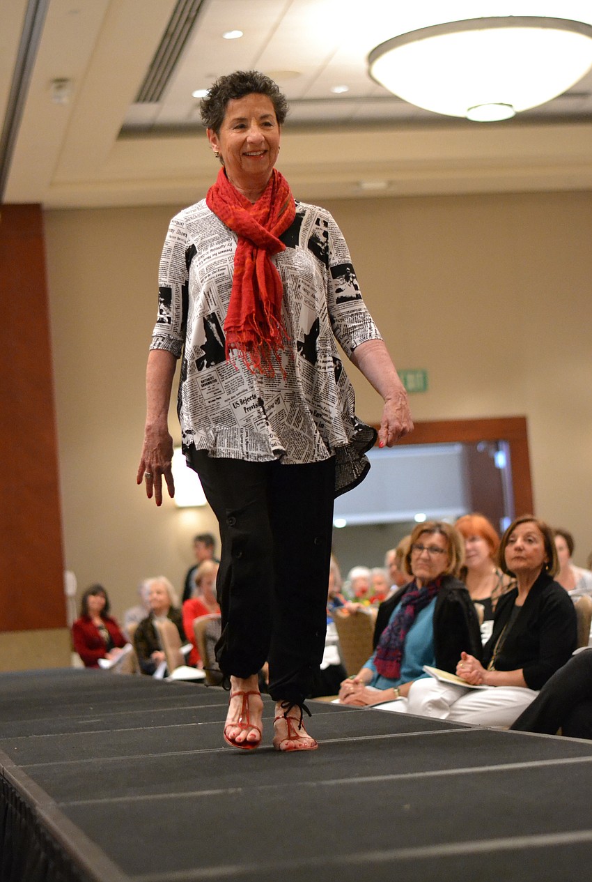 Susan Brown strolls down the catwalk during the Sarasota Garden Club Fashion Show.