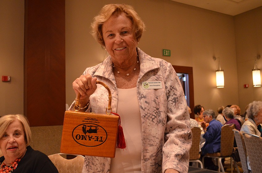 Jane Slaughter with her custom cigar box purse.