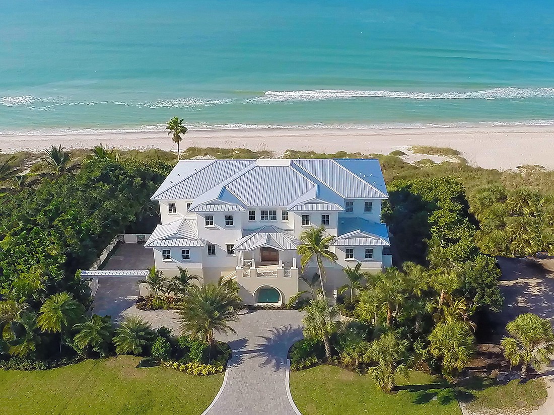 The home at 3475 Gulf of Mexico Drive has five bedrooms, five-and-a-half baths, a pool and 6,183 square feet of living area.