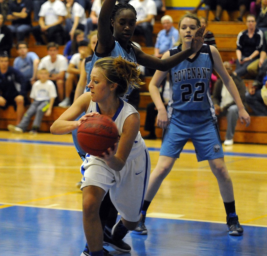 Sarasota Christian senior Nicole Miller hauls in a rebound in the second quarter.