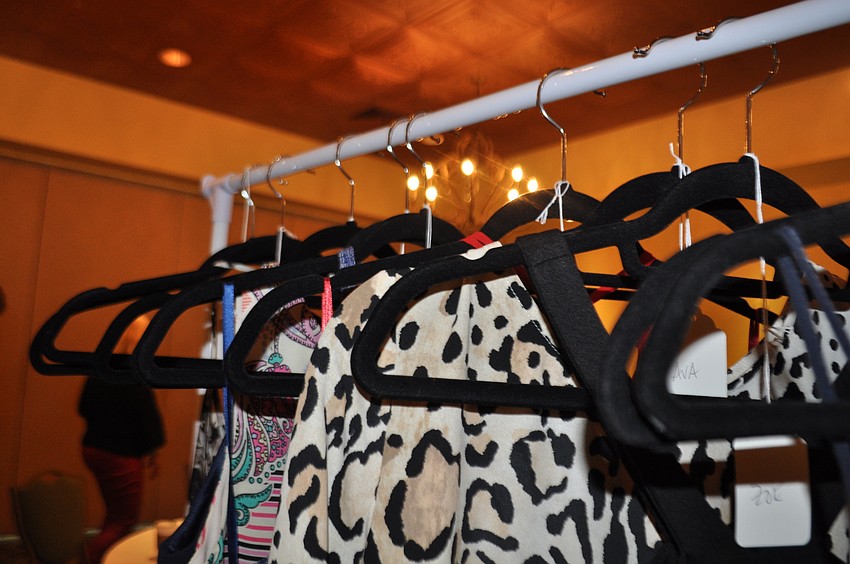 Girl Scouts from local troops modeled clothing from local businesses.