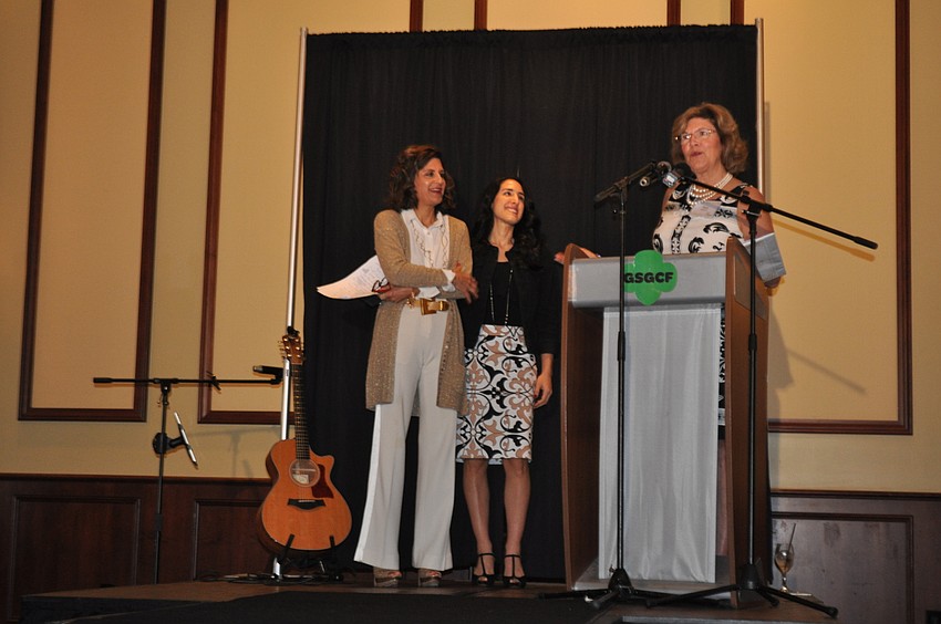 Lisa and Megan Krouse, mother and daughter and Girl Scout alumni, are introduced by Sue Stewart, CEO of Girl Scouts of Gulfcoast Florida.