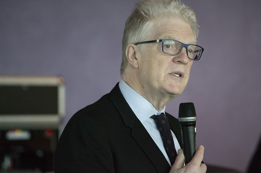 Sir Ken Robinson answers questions from guests at the luncheon portion of the lecture.