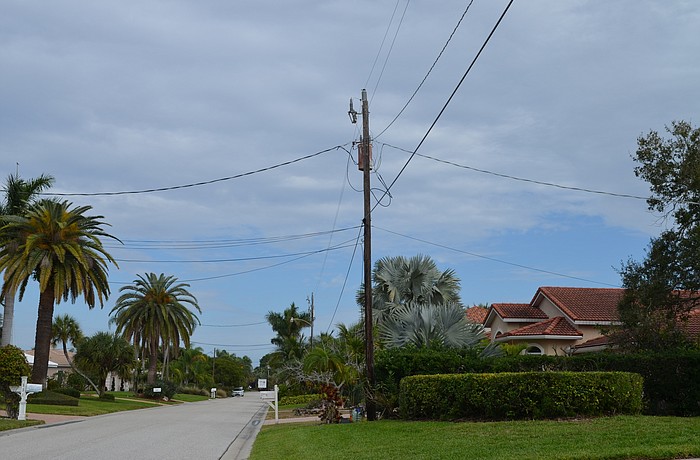 The town manager is investigation allowing neighborhoods like Country Club Shores  to opt out of the town's neighborhood undergrounding project.