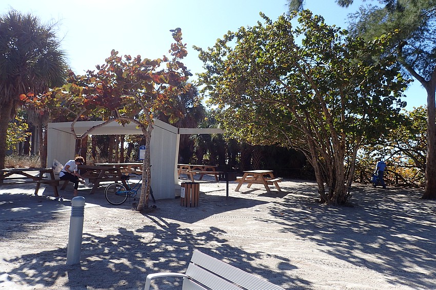 A new, concrete picnic shelter.