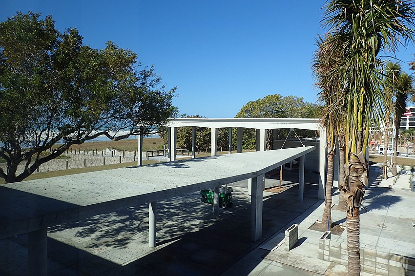 The historic pavilion in the distance, whose physical connection to the pavilion in the foreground allowed the new offices to be built at grade. The original pavilion is designated historic and so did not have to meet elevation requirements.