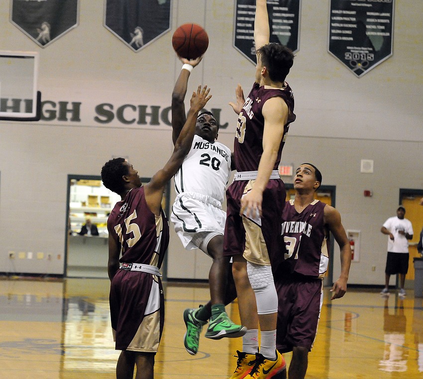 Lakewood Ranch guard Devin Twenty puts up a shot in the second quarter.