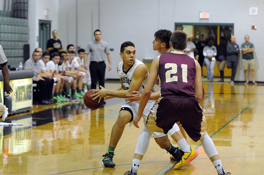 Lakewood Ranch junior forward Kodey Elliott looks to pass the ball in the first half.