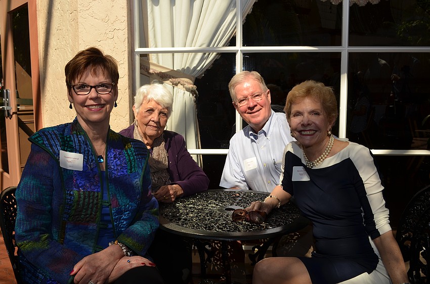 Claudette, Lila and Larry Lansrud with Caring Heart of the Year recipient Marcella Schuyler