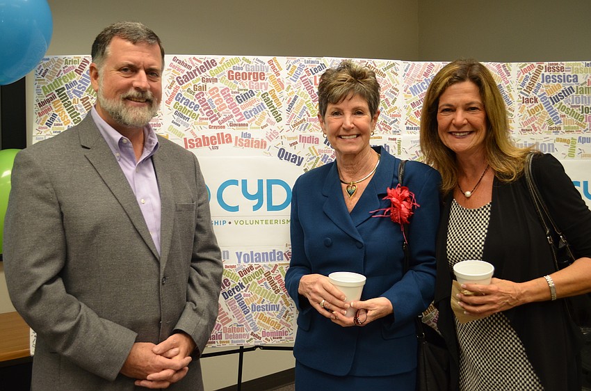 SCOPE Executive Director John McCarthy with former Sarasota Count Commissioner Shannon Staub and Claudia Cardillo