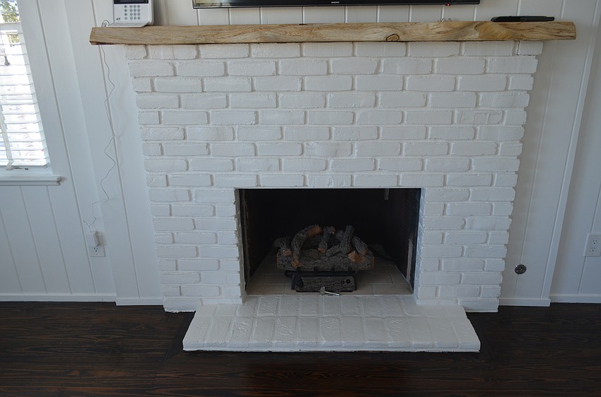 The fireplaces from when the house was originally built in 1949 still stay the same with the exception of an updated mantle.