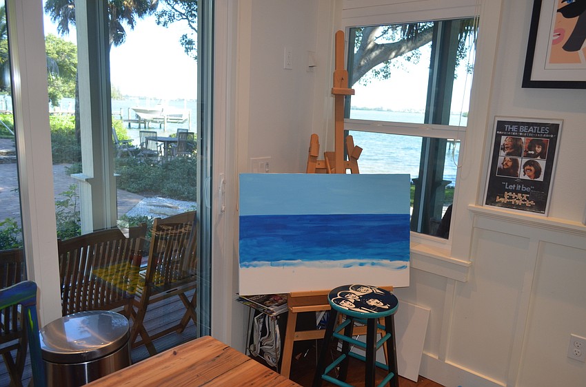 Sherry King enjoys painting in a room with views of Sarasota Bay.