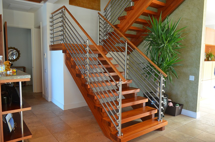 The open staircase leading to the second floor was made from reclaimed Southern Heart Pine.