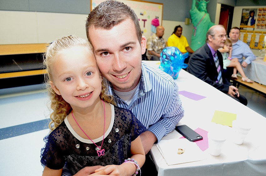 Maci Muldon brings her date, her dad, T.J.