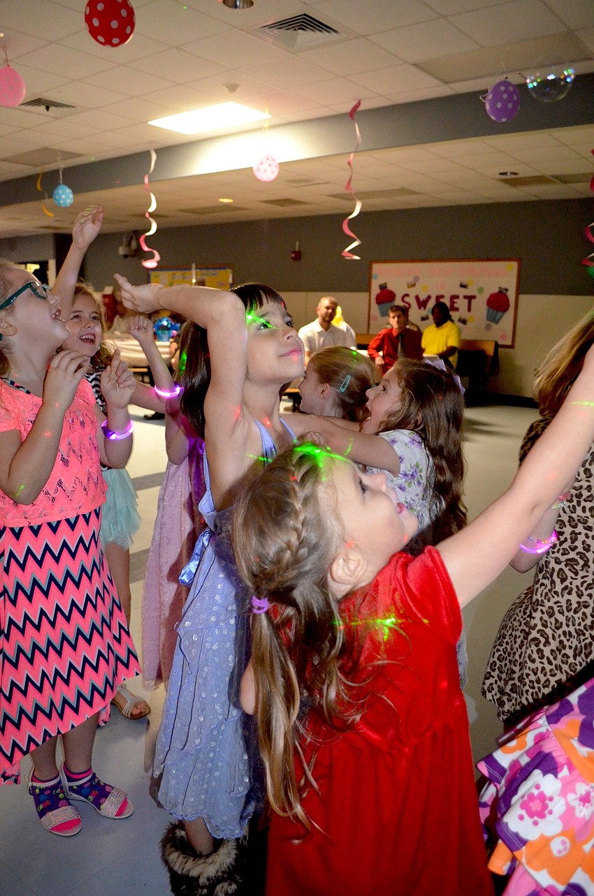 Bashaw Elementary students jump for bubbles.