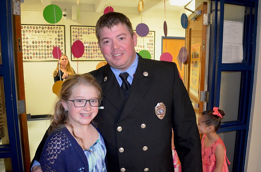 Mea and Josh Adkins look for a spot on the dance floor before the next song.