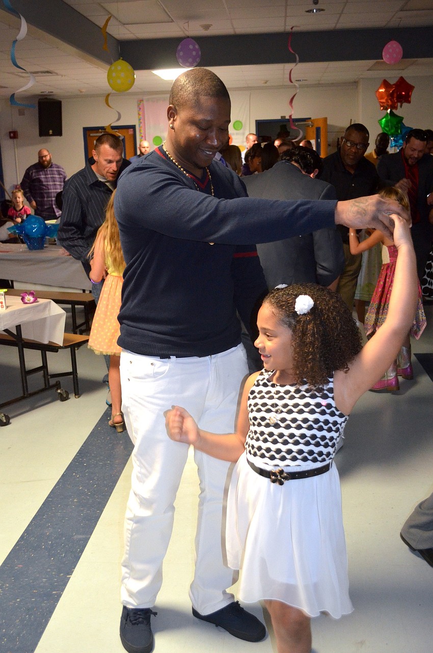 Michael Randall dances with his daughter, Jae-Lah.