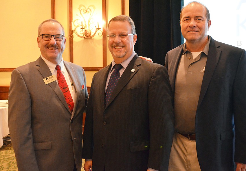 Greater Sarasota Chamber of Commerce President and CEO Steve Queior with guest speaker Tony Carvajal and Sarasota County Administrator Tom Harmer