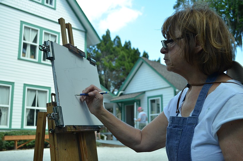 Fran Mangino sketches out the Guptill House.