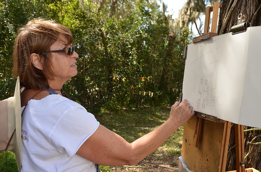 Fran Mangino sketches out the Guptill House.