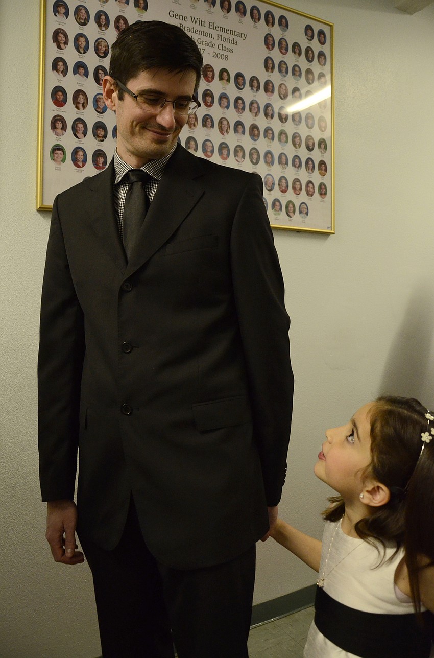 Bob and Charlize Norman wait in line for the dance to begin.