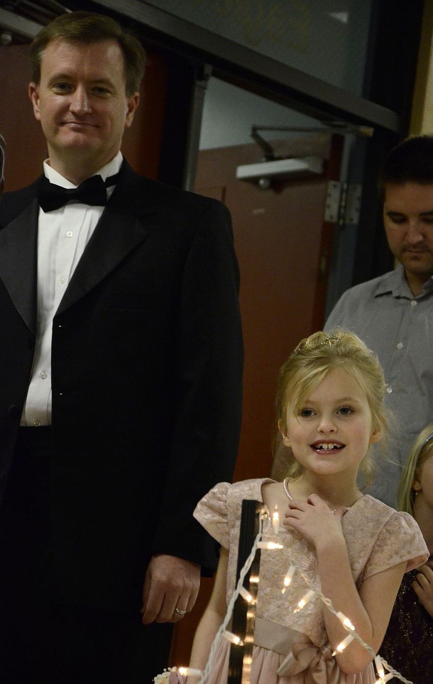 Barry and Meagan Durham wait in line for a professional photo.