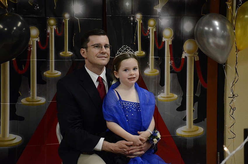Michael and Savannah Cooley get a portrait.