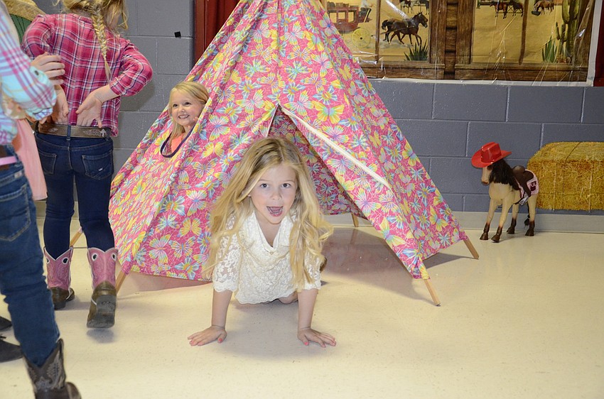 Aliyah Summers and Brylee Johnson try out the teepee.