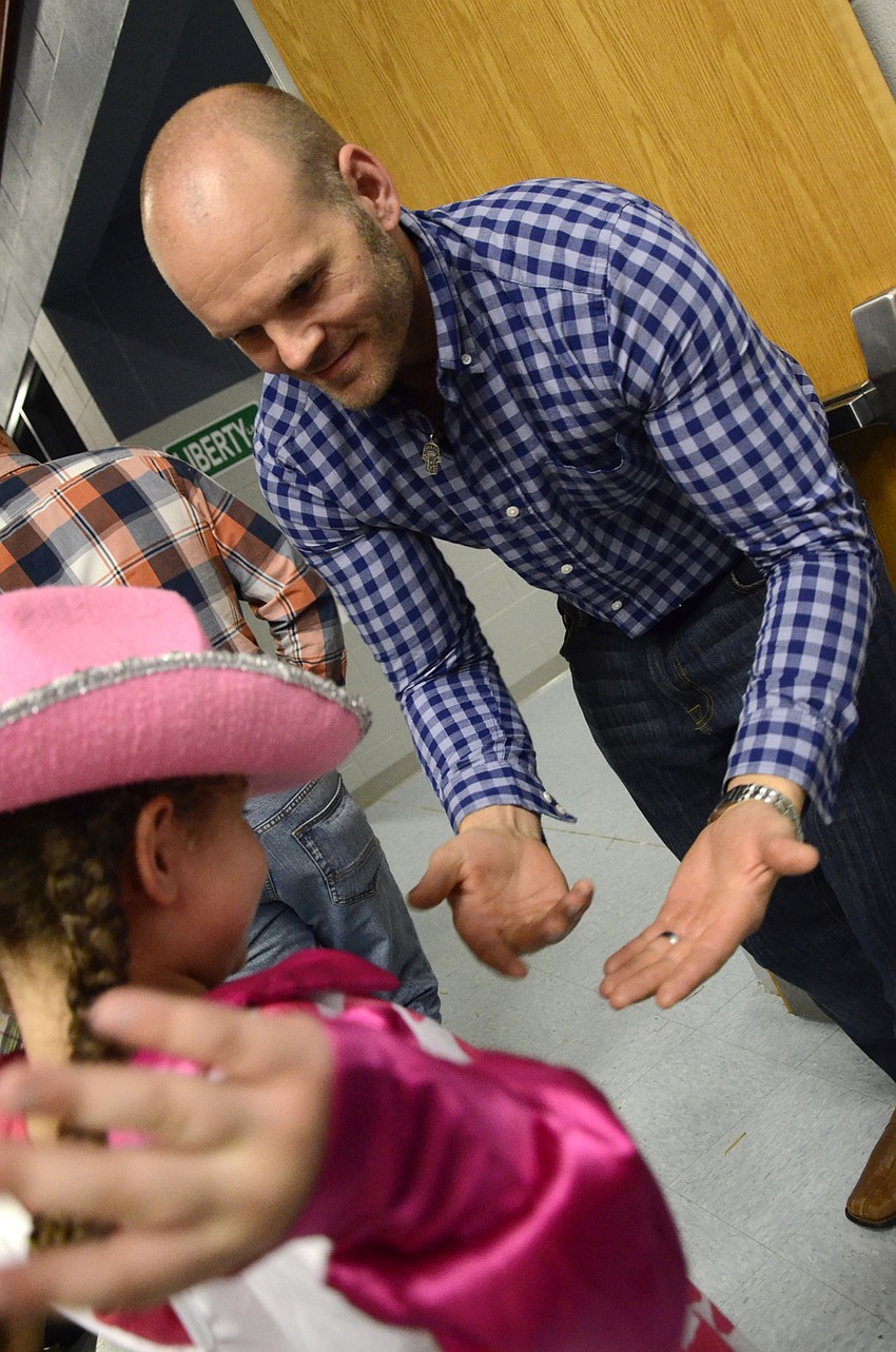 Adam Chaykin plays the classic dad game of smacks with his daughter, Aliyah.