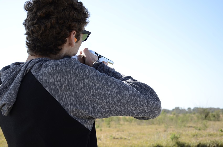 Josh Schmidt aims for a clay.