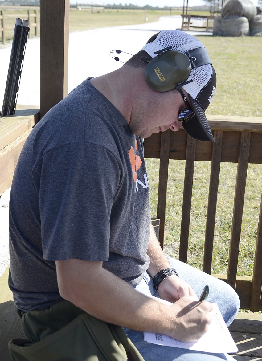 Kyle Prince keeps score for his team.