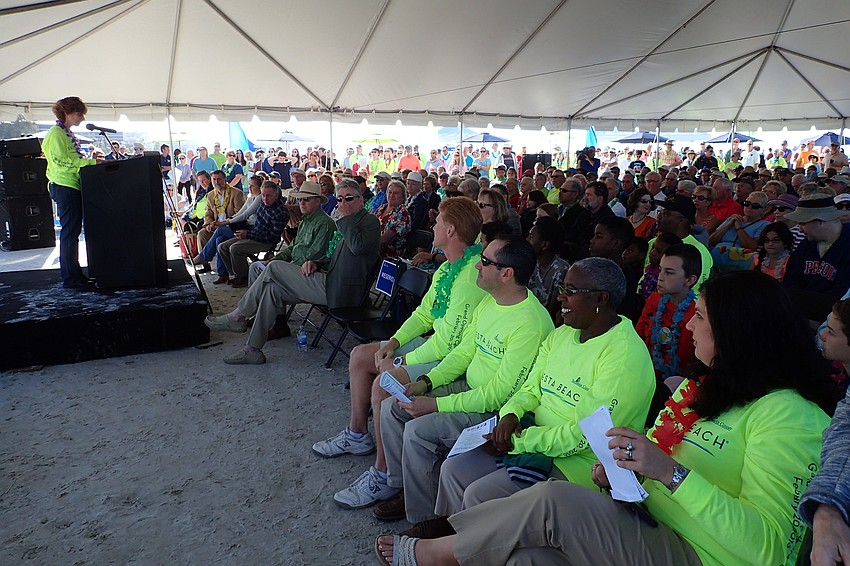 In the foreground (wearing bright green), county commissioners Charles Hines, Paul Caragiulo, Carolyn Mason and Christine Robinson