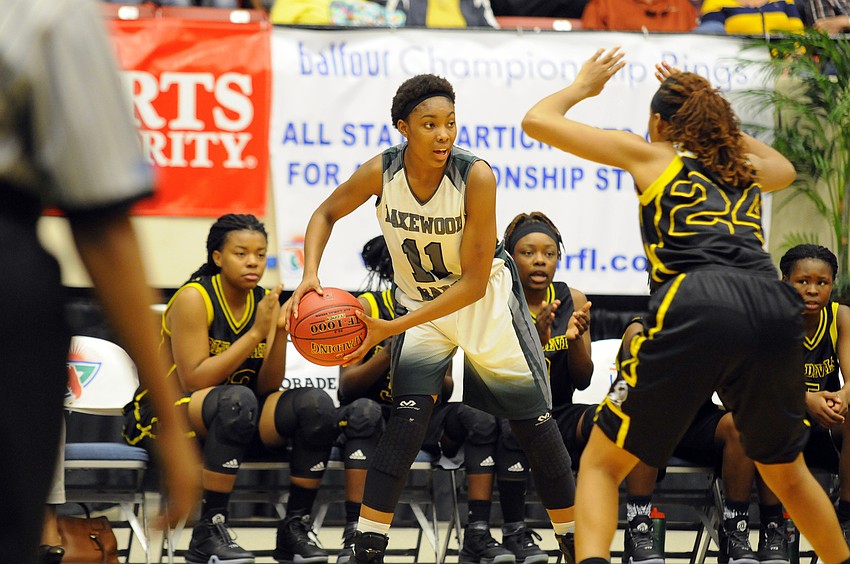 Lakewood Ranch junior India Searls looks to pass the ball in the first half.