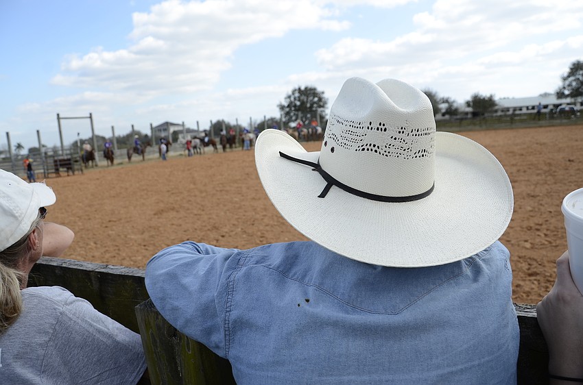 Brian Chamness with SMR watches cattle roping.