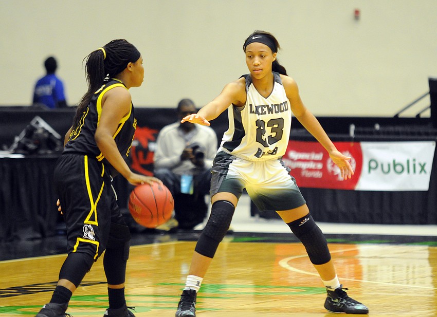 Lakewood Ranch junior forward LaDazhia Williams defends Winter Haven's Chrisana Scott in the fourth quarter.