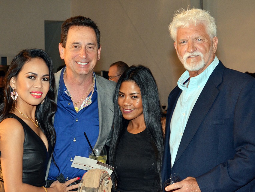 Sheila Watkins and Eric Peters with Nora and Jack Clark