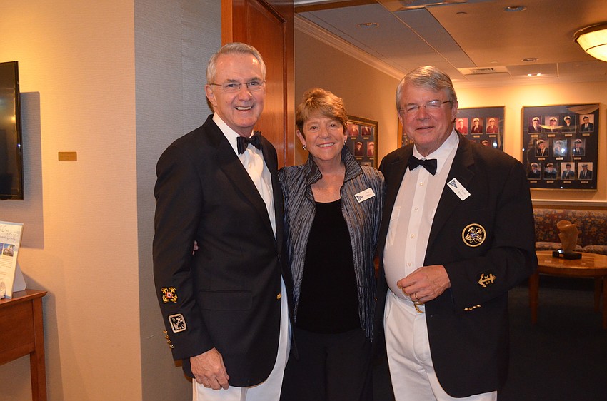 Former Commodore Bob Hunter with Sue and incoming Rear Commodore Charlie Wilson