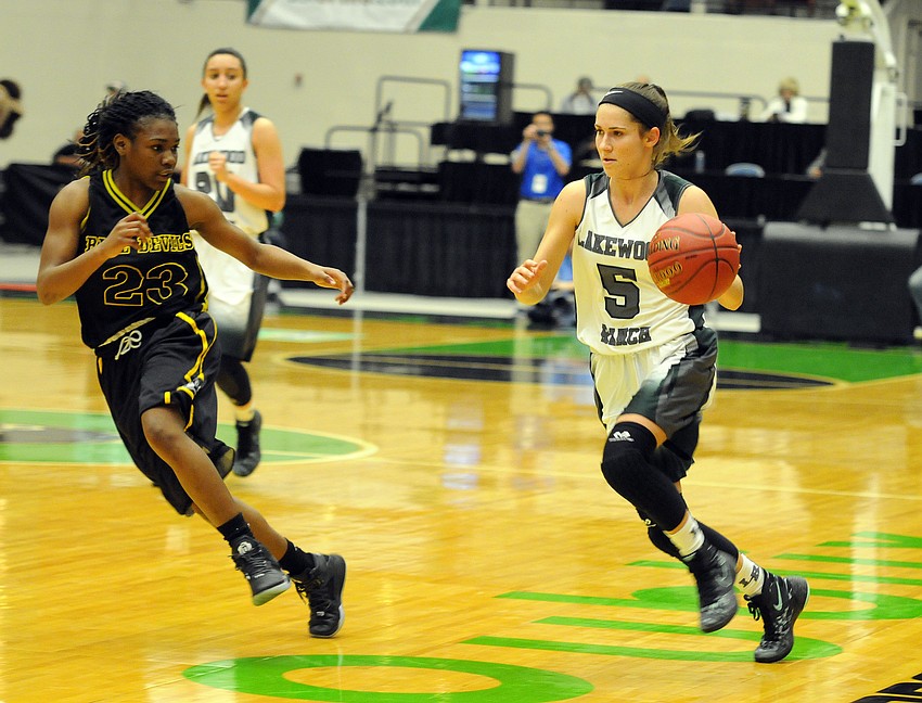 Lakewood Ranch senior point guard Kailyn Scully pushes the ball up the court in the first half.