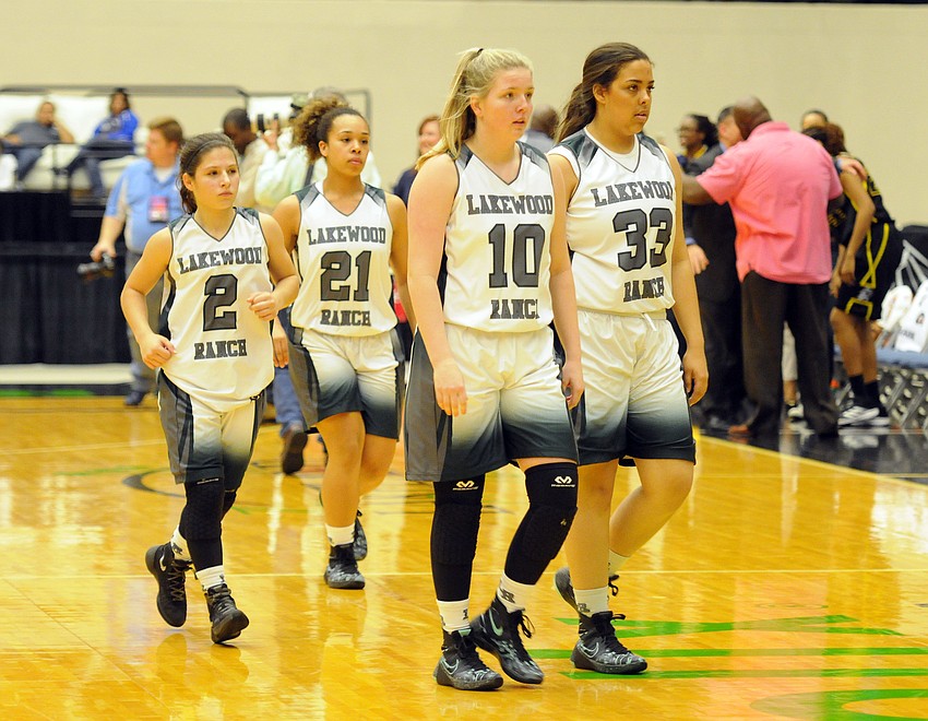 Lakewood Ranch's Sarah Fazio, Jordan Ward, Rhiannon Jacobson and Kwinci Gooch walk off the court following Lakewood's 48-24 loss to Winter Haven in the Class 7A state championship Feb. 20.
